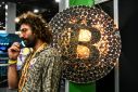 Bitcoin whipsawed after a post on X saying the Securities and Exchange Commission had approved ETFs for the unit was later denied