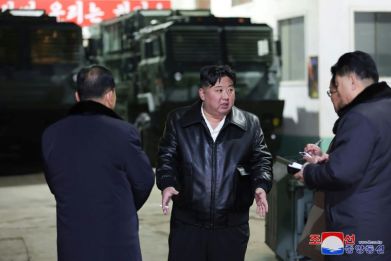 North Korean leader Kim Jong Un (C) has toured numerous weapons manufacturing facilities in recent months