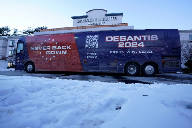 A DeSantis campaign bus is seen in New Hampshire on Tuesday with the slogan of Never Back Down, the political group that had backed him to the tune of millions of dollars