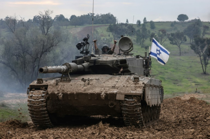 An Israeli tank returns from war-torn Gaza on January 28, 2024