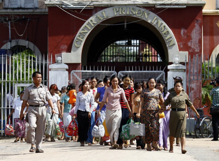 Released prisoners make their way out of Insein Prison in Yangon