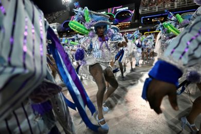 Members of the Porto da Pedra samba school perform during the first night of the Carnival parade at the Marques de Sapucai Sambadrome in Rio de Janeiro, Brazil on February 11, 2024