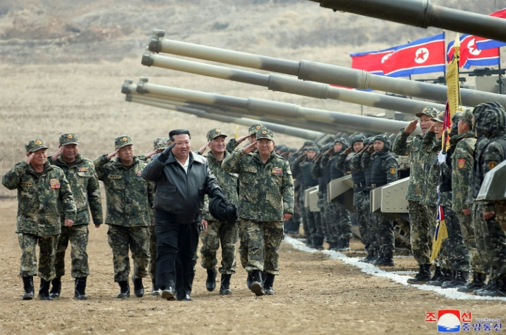 A North Korean official KCNA photo shows leader Kim Jong Un visiting Korean People's Army tank crews during training on March 14