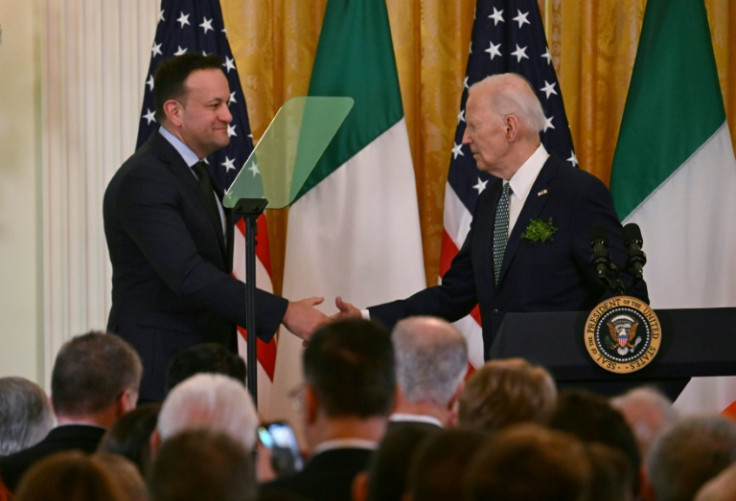 US President Joe Biden (R) shakes hands with Taoiseach of Ireland Leo Varadkar during a St. Patrick’s Day Celebration in the East Room of the White House in Washington, DC, on March 17, 2024