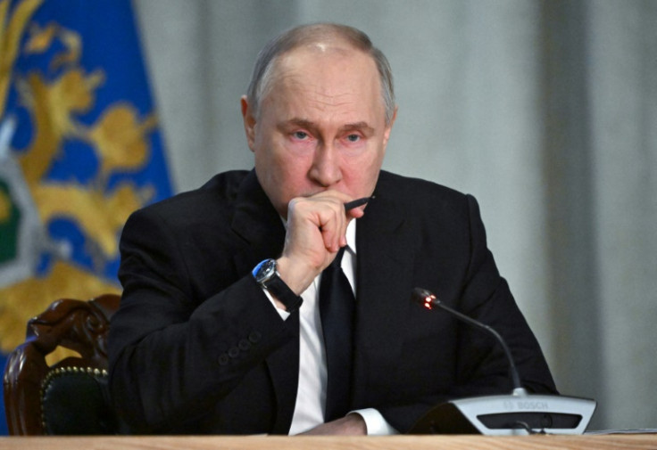 Vladimir Putin has said 'radical Islamists' were behind last week's attack but sought to tie it to Kyiv