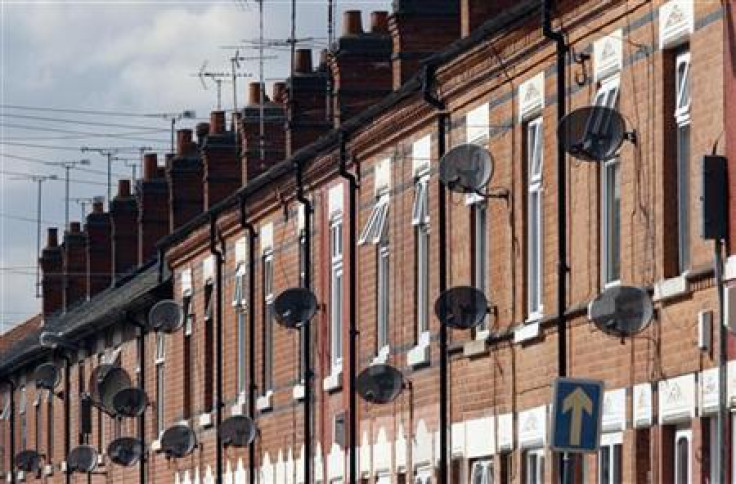 Satellite television dishes are seen fixed to a row of terraced houses in Leicester