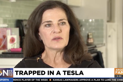 Woman trapped in tesla