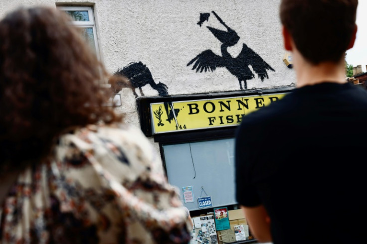 Speaking in front to two pelicans painted over a fish shop in Walthamstow, northeast London, Peter McCarthy said it had been "very nice to have it in this particular week"