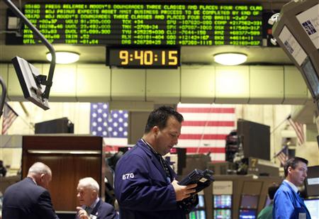 Traders work on the floor of the New York Stock Exchange