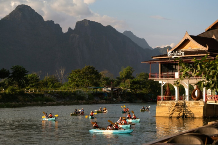 Vang Vieng in Laos was once synonymous with alcohol and drug-fuelled jungle parties for backpackers but has since re-branded as an eco-tourism destination