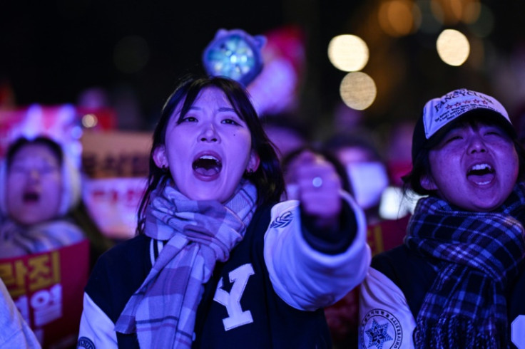 Massive crowds gathered outside parliament on Saturday to pressure lawmakers to oust the president