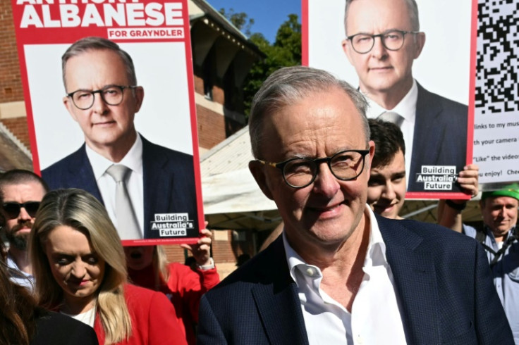 Australia's Prime Minister Anthony Albanese arrives to vote in the country's general election at a polling station in a primary school in the suburb of Marrickville in Sydney on May 3, 2025. Millions of Australians voted on May 3 in a bitterly contested g