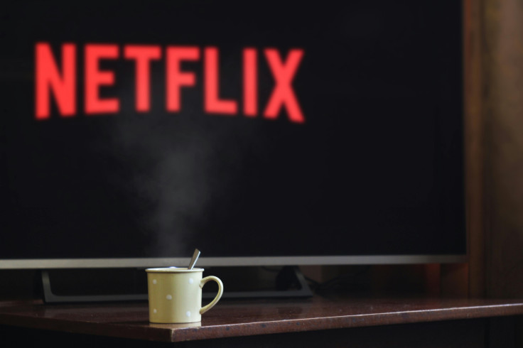 cup of coffee with netflix on the background