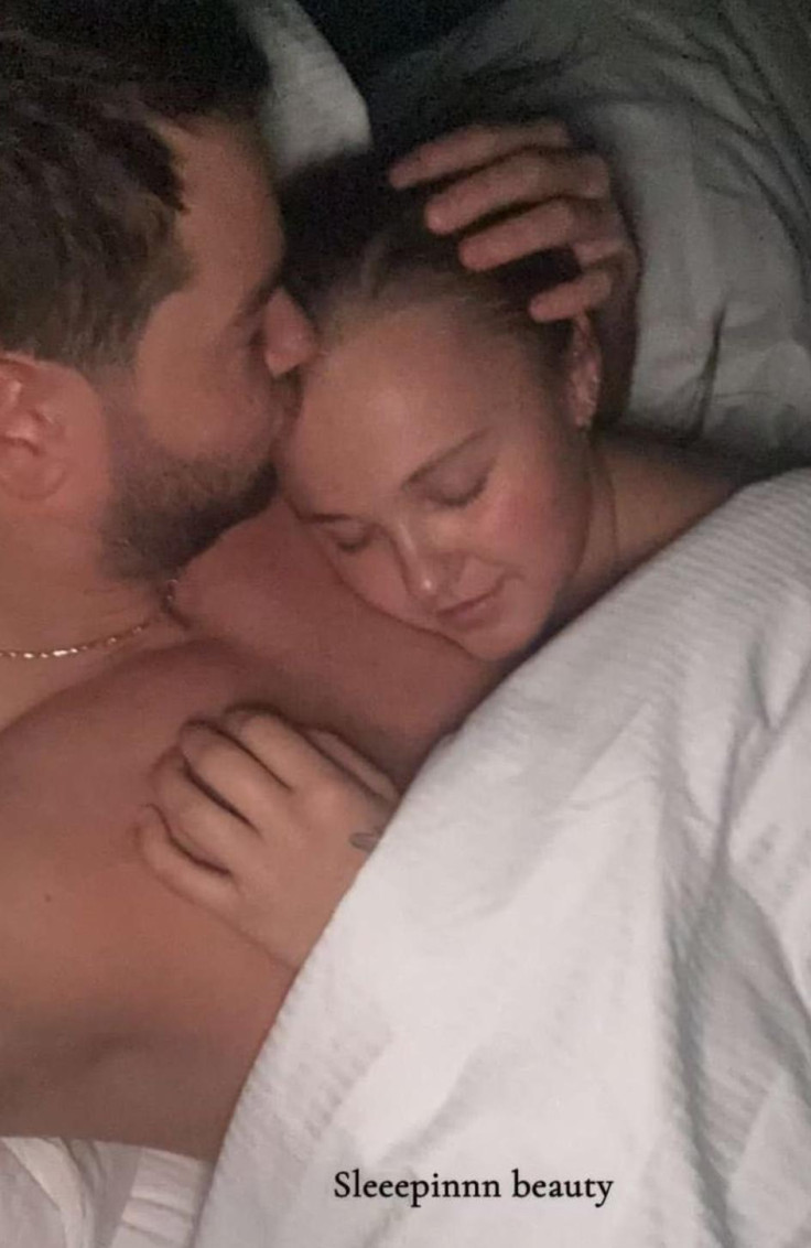 Chris Hughes kissing Jojo Siwa's forehead on a Snapchat story