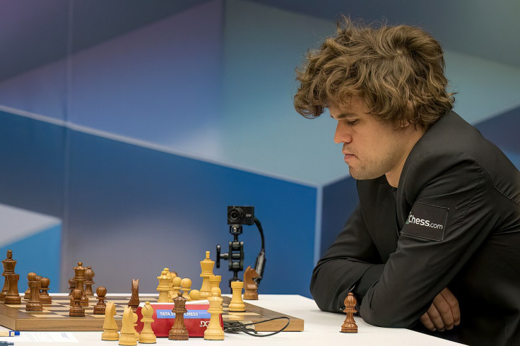 World Chess Champion Slams Table After Loss To Gukesh Dommaraju