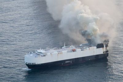Cargo Vessel on fire, still floating