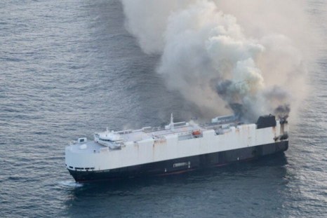Cargo Vessel on fire, still floating