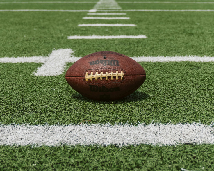 Brown and black football