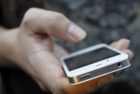 Holding iPhone