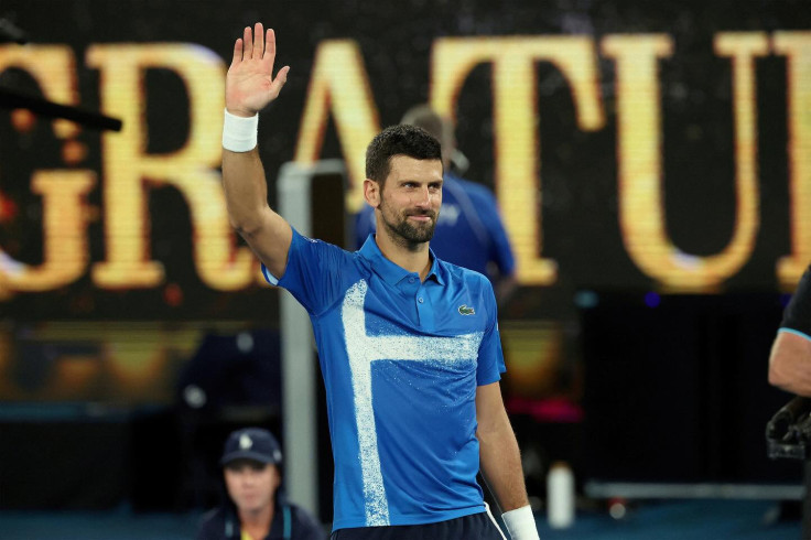 Novak Djokovic wearing blue shirt