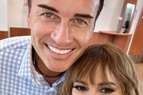 Julian McMahon and Alyssa Milano share smiles and timeless friendship.