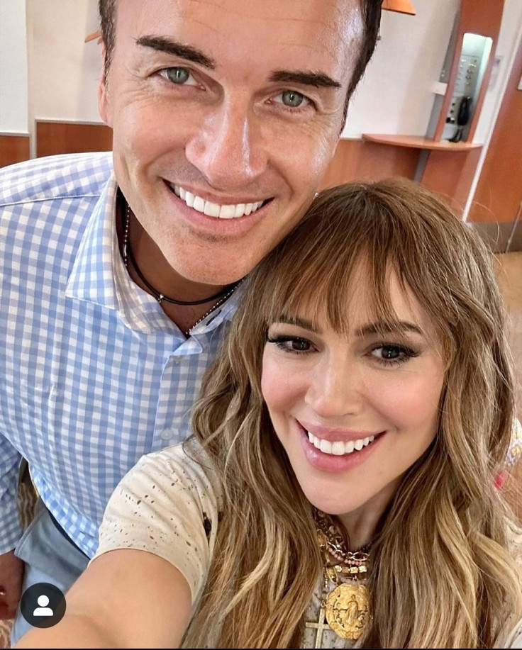 Julian McMahon and Alyssa Milano share smiles and timeless friendship.