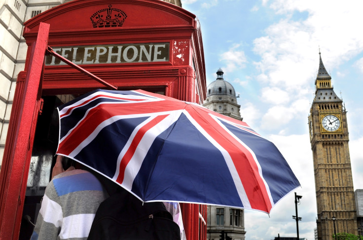 A young man with an umbrella in london