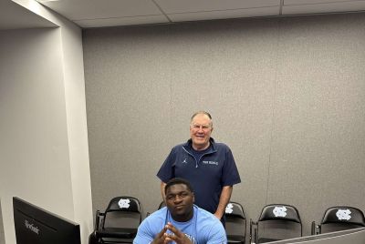 Bill Belichick with Dereon Albert