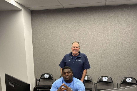 Bill Belichick with Dereon Albert