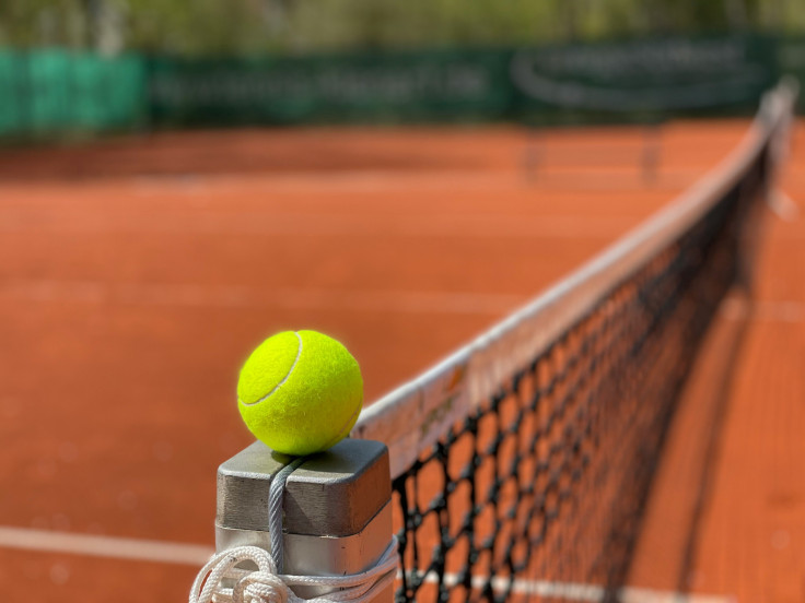 Tennis ball on tennis court