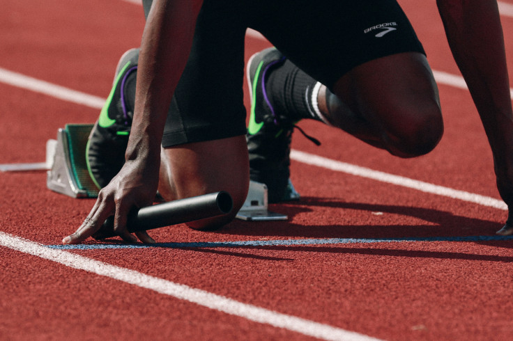 Man on running field