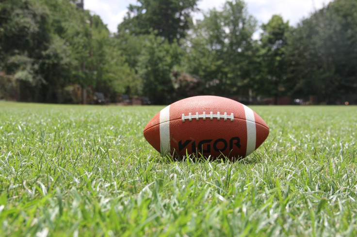 Football on grass.