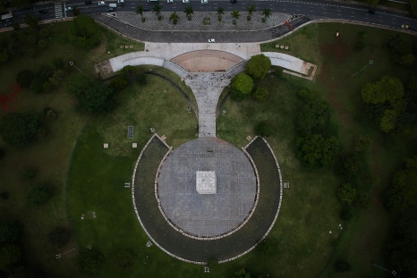 Aerial photo of grass field and tomb during daytime