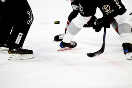 People playing ice hockey