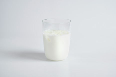 White liquid in a clear drinking glass