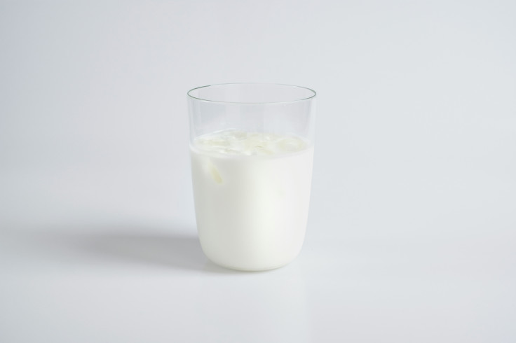 White liquid in a clear drinking glass