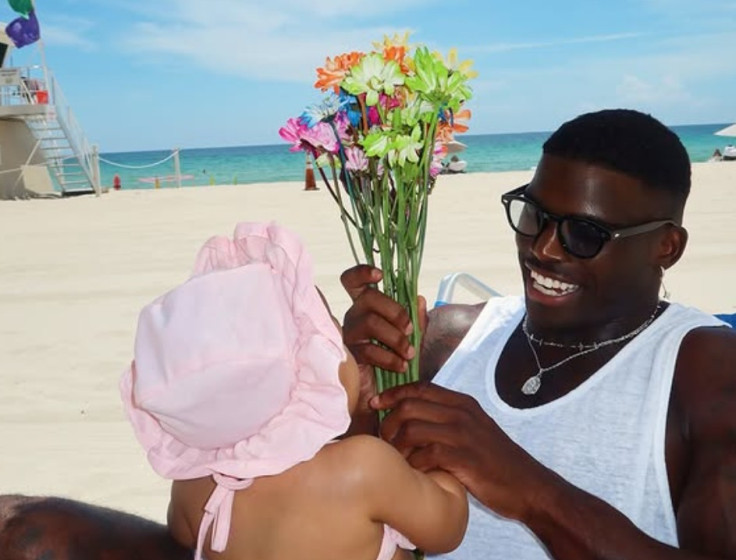 Tyreek Hill and baby Capri