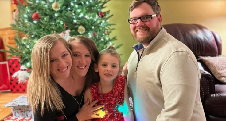 Abby and Brittany Hensel, along with husband Josh and stepdaughter