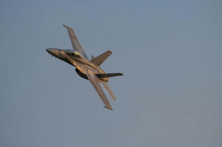 A jet fighter flying in the sky