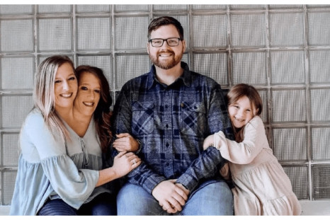 Abby and Brittany Hensel with Joshua Bowling and his daughter