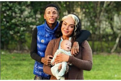 Alex Venegas with his wife and son