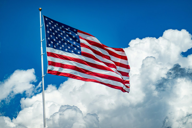 An American flag flying high in the sky