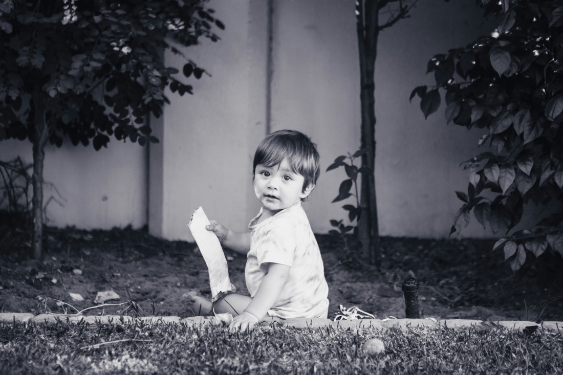 A child sitting on the ground