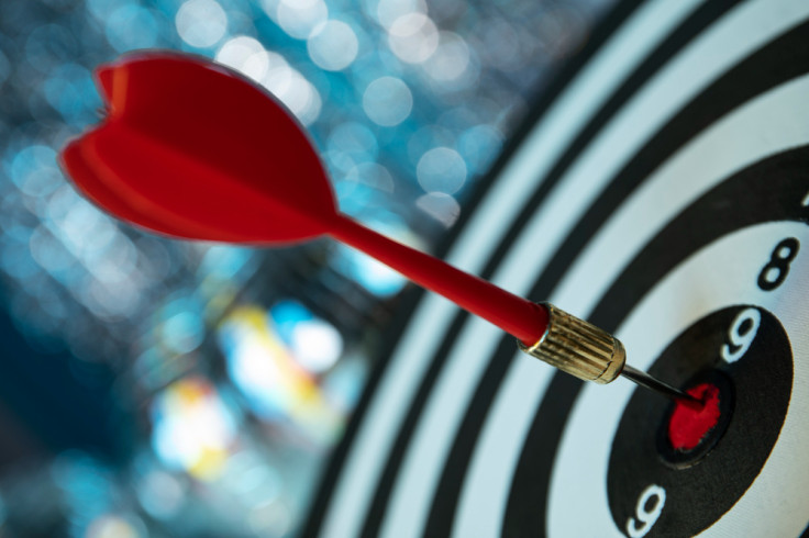 View of Dartboard With Bullseye Arrow Points