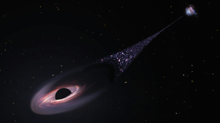 Rogue Feeding Black Hole Seen Wandering Through Its Galaxy