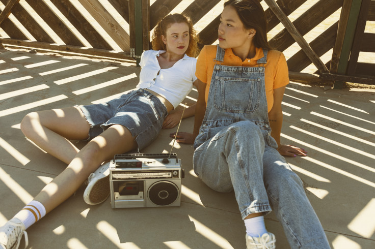 Full shot girls with cassette player