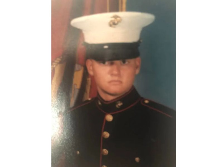 Jake Sanford in young navy outfit