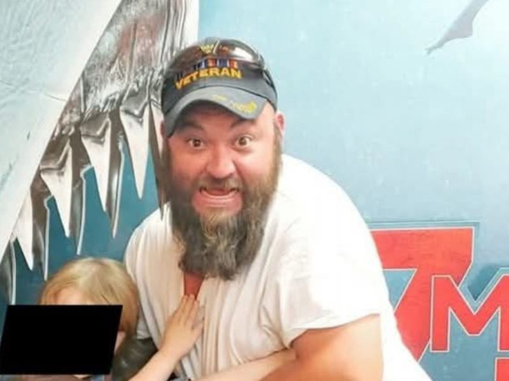 Jake Sanford with child