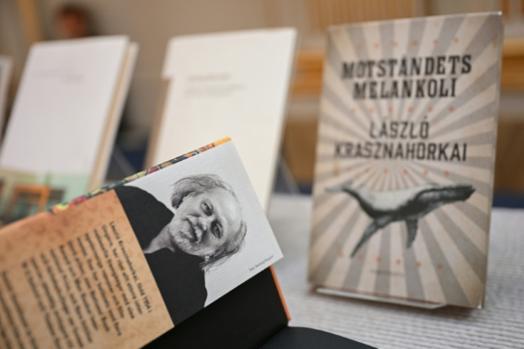 Laszlo Krasznahorkai's works explore themes of postmodern dystopia and melancholy
