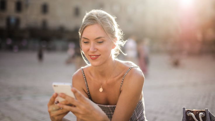 Smiling at Phone